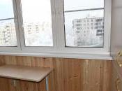 На фото - откидной столик для балкона из ламинированной ДСП